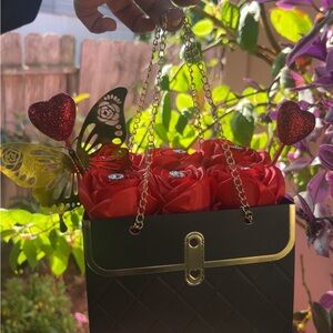 Elegant Black and Gold Women's Bag with Red floral